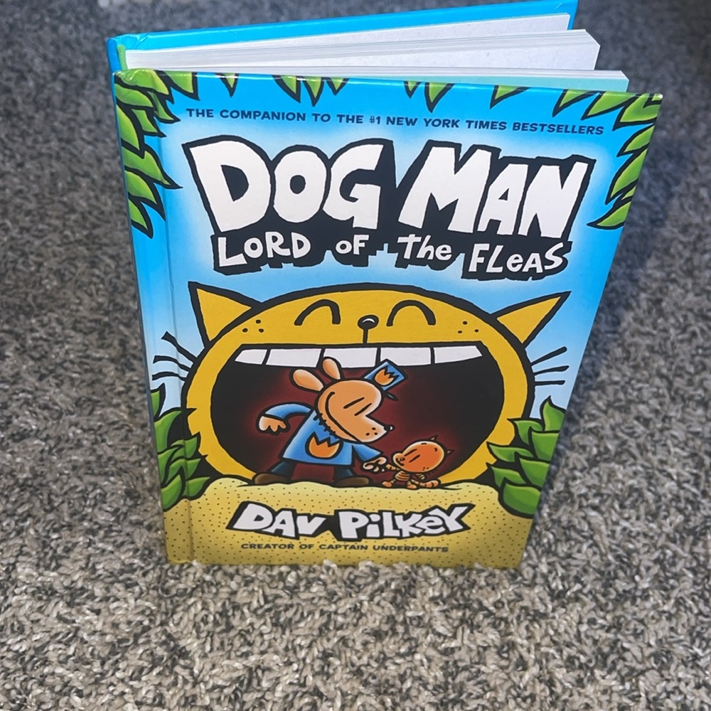 Kids book Dog Man Lord of the Fleas by Dav Pilkey comic book style scholastic